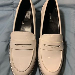 Brand new DKNY white loafers! Never been worn.